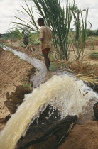 Local men and irrigation channel in project to restart agriculture in area devastated by war near Mandera funded by Trocaire.