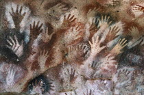 Cave of the Hands.  Prehistoric rock paintings of human hands in red black and orange 13 000 to 9 500 years old.