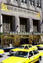 Waldorf Astoria Hotel and yellow taxis