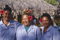 Ringiroa.  Portrait of women workers in hotel complex.