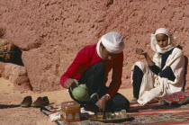 Tuareg man pouring tea.Nomadic people of Berber origin toureg