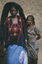 Threequarter portrait of two young Tuareg women.Nomadic muslim minority of Berber origin Moslem Colored Coloured