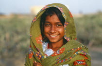 Portrait of smiling Gypsy girl. romany