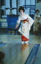 Geisha girl in bowling alley.