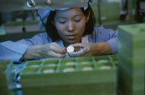 Worker in a watch factory