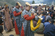 Procession of priests with horns at Padmasambhava festival