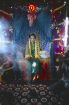 Muslim child bride at wedding ceremonyMoslem