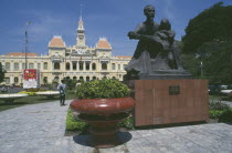 Hotel de Ville Peoples Committee building with Ho Chi Minh statue in frontHo Chi Minh City