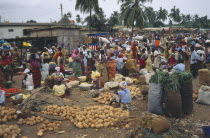 Crowded market with mixed produce