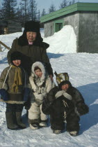 Koriak family wearing assorted fur coats