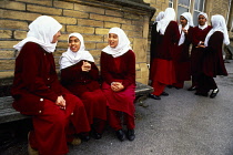 Iran, Schoolgirls wearing Chadoor in the playground of a school near the main square in Isfahan.