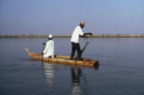 Fishermen in a reed boat