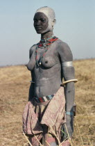 Dinka woman wearing traditional bead jewellery.
