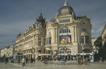 Place de le Comedie with tables and chairs outside