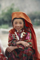 Portrait of Kirghiz girl in traditional dress.