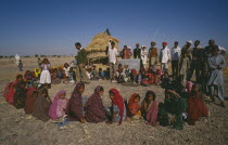 Pupils and teachers at desert school.