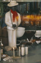 An Umbanda shrine and icons a combination of slave voodoo beliefs and Christianity  Brasil