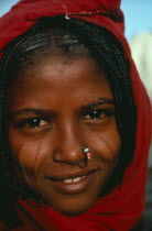 Portrait of girl with facial scarification