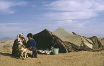 Berber woman and child outside tent