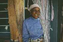 Portrait of smiling woman at Kisongo Masai market outside Arusha.
