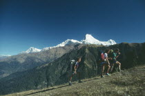 Trekkers above Ghorepani with Annapurna in the distance