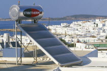 Solar powered water heater on rooftop.
