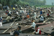 Small rowing boats waiting for tourist custom at the Perfume Pagoda.