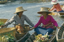 Floating Market. Women fruit sellers.