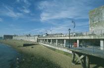 Old Portsmouth. View across occupied strectch of beach next to the Walls.