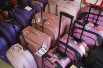 High street luggage shop interior with cases on sale