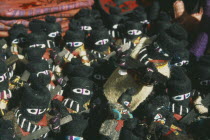 Zapatista  subcomandante Marcos. Dolls on sale in a street market.