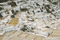 People working on the Salt Mines dating back to Inca times. Near Urubamba. Cuzco  Cuzco