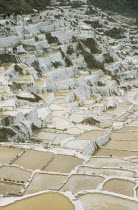 People working on the Salt Mines dating back to Inca times. Near Urubamba. Cuzco  Cuzco