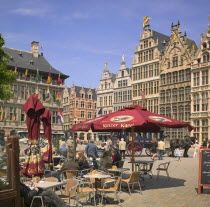 Cafe in Grote Markt  Main Square with a horse and carriage behind.Travel  Holidays  Tourism