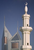The Emirates Towers with a minaret in the foreground.Travel  Tourism  Minaret  Islam  Dubayy  United Arab Emirates