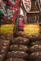 Stall selling Fruchtebrot and Lebkuchen  traditional German festive food  in the Christmas Market in Hauptmarkt.Christkindlesmarkt  Festive  Advent  Yuletide  Travel  Holidays  Tradition  Food  Fruit...