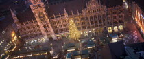 Panoramic view of the Christmas Market beneath the Rathaus.Christkindlesmarkt  FestiveAdventYuletideTravelHolidaysChristmas TreeFairy LightsRathausPanorama
