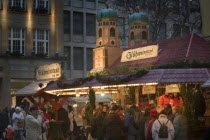 People at a Gluhwein stall at the Christmas Market.Christkindlesmarkt  FestiveAdventYuletideTravelHoliday