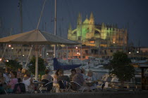 Palma de Mallorca  Cafe with the Cathedral behind  set in the evening.MajorcaTravelTourismHolidaysMediterranean