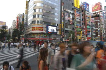 Shinjuku. Entertainment district Kabukicho on Saturady evening with pedestrian crossing of Yasukuni-dori in the foreground