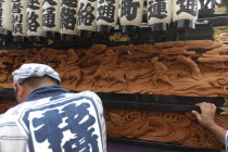 Gion MAtsuri. Elaborate traditional wood carving detail on a panel on one of the dashi wagons