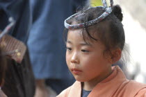 Etsuko Watanabe  8 years old  is a "tekomae" which is a young girl who walks in front of the wagon in the Gion Matsuri