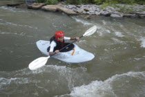 12 year old Japanese student Satoshi Ui  rides white water during a kayaking class of Genessee Waterways Center at Lock 32 Centre  Centre