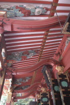 Nezu Jinja. Momoyama style elaborate decoration of the shrines veranda in a vermillion color