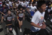 11 and 12 year old boys at the start of 2 kilometer race on Chiba Prefectural Fitness day 5th and 6 th grade