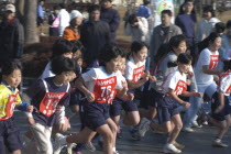 Girls await the start of 2 kilometer race which is part of the towns fitness festival