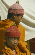 Two novice Theravada Buddhist monks.