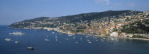 Beaulieu sur Mer. View of the coastal town and moored boats seen from Cap Roux