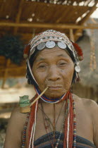 Portrait of Akha tribeswoman smoking pipe.I-Kaw