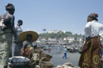 Dockside fish vendors and the Fort behind